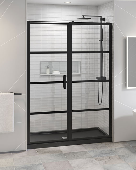 A pivot glass shower door in a beautiful grid design in matte black with an option to swing in or out