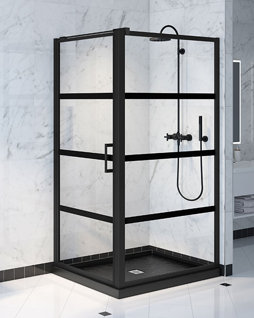 A cube corner pivot shower door in matte black finish with a black solid surface shower base