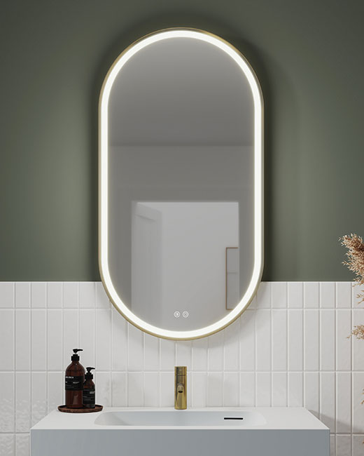 un miroir de salle de bain DEL mural avec cadre oblong.