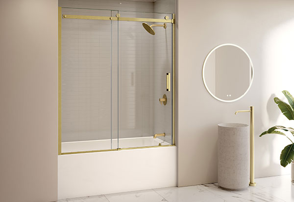 A Modern bathroom with brushed gold accents in the sliding tub enclosure