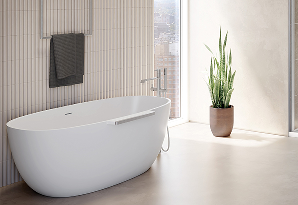 Fleurco's solid surface aria stone Lucia bathtub in a smooth plaster style bathroom